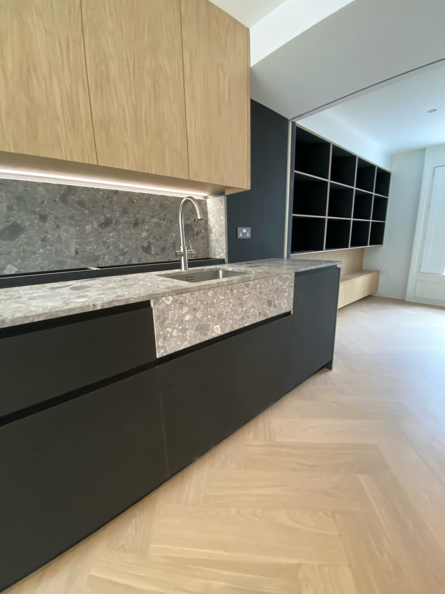 black Richlite and oak kitchen